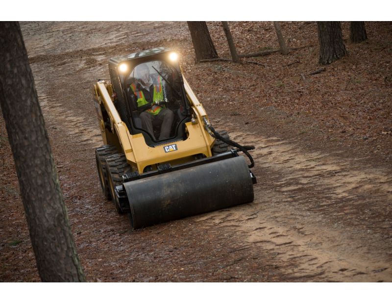 Cat® Vibratory Drum Compactor Smoothing a Path