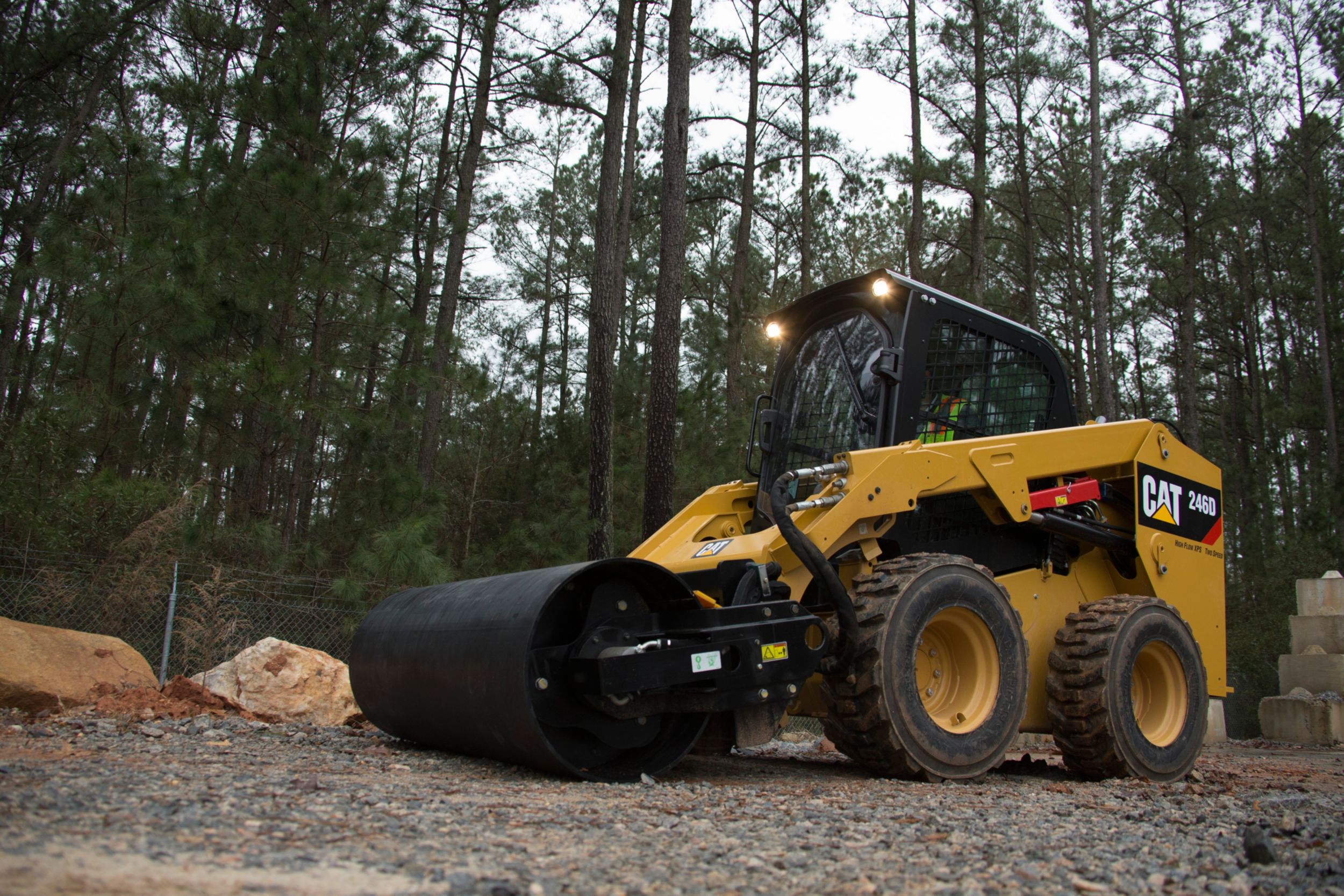 product-Cat® 246D Skid Steer Loader and Vibratory Drum Compactor at Work