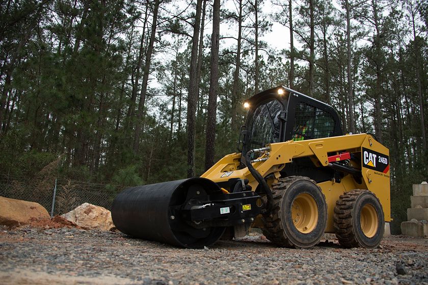 Cat® 246D Skid Steer Loader and Vibratory Drum Compactor at Work