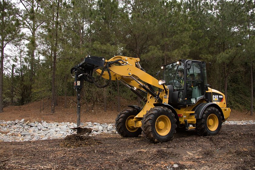 Cat® Auger at Work on a 908M Compact Wheel Loader