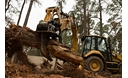 Cat® 420F2 Backhoe Loader with Thumb and Ripper in Working Application