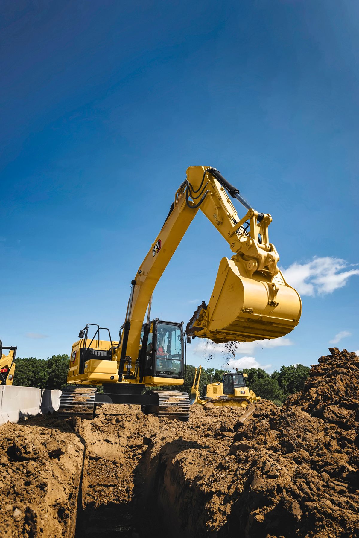 320 Hydraulic Excavator digging a trench