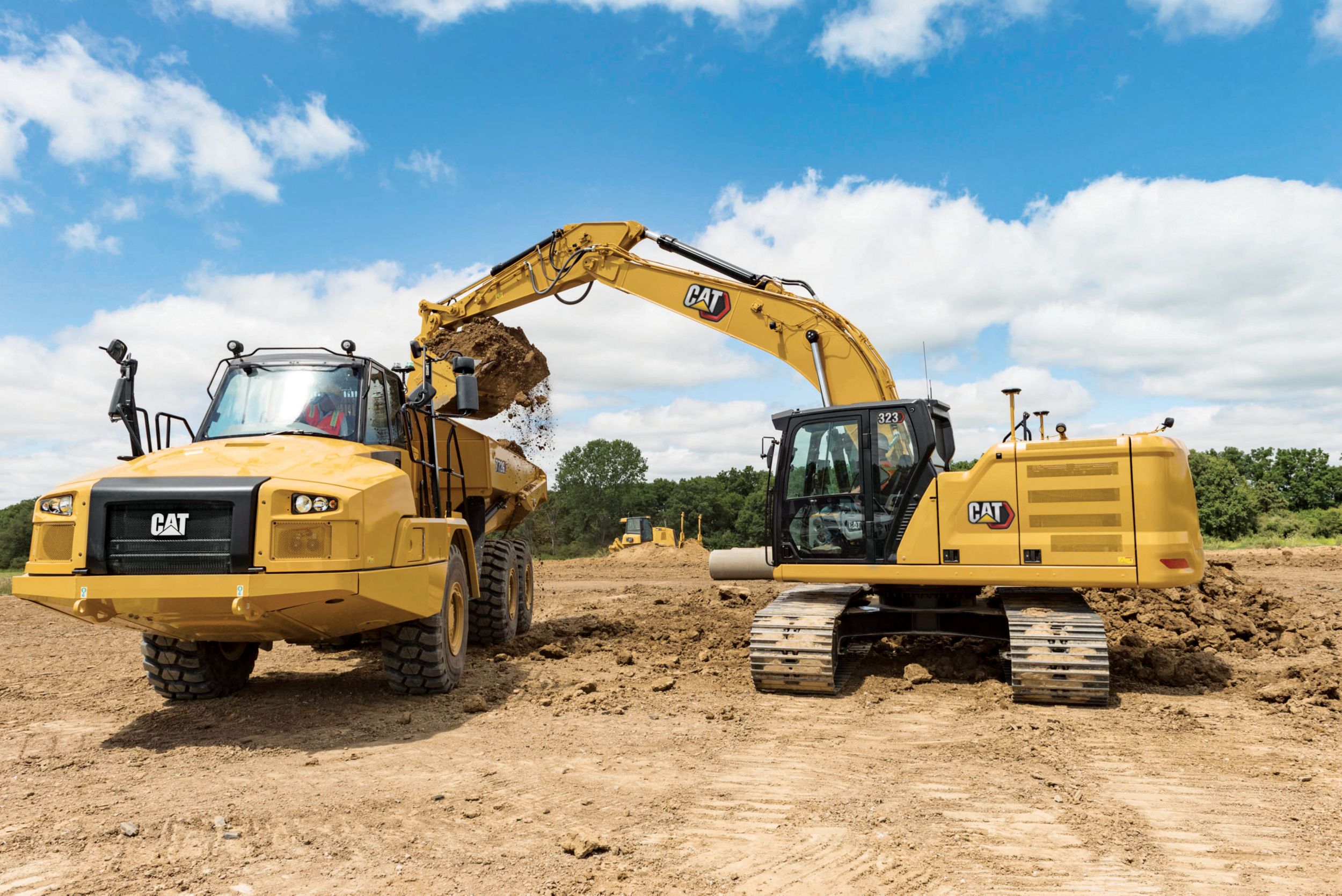 323 Excavator Filling an Articulated Truck