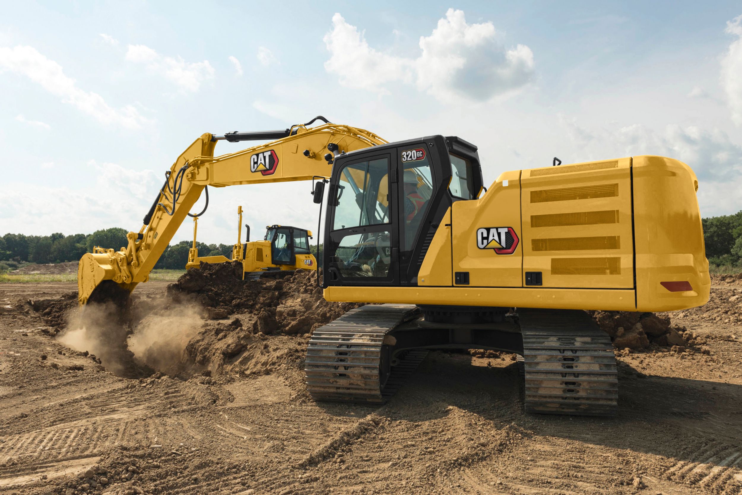 320 GC Excavator digging a trench