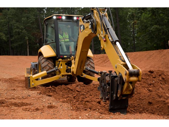 Using backfill plate on Cat® Compaction Wheel to smooth trench bottom