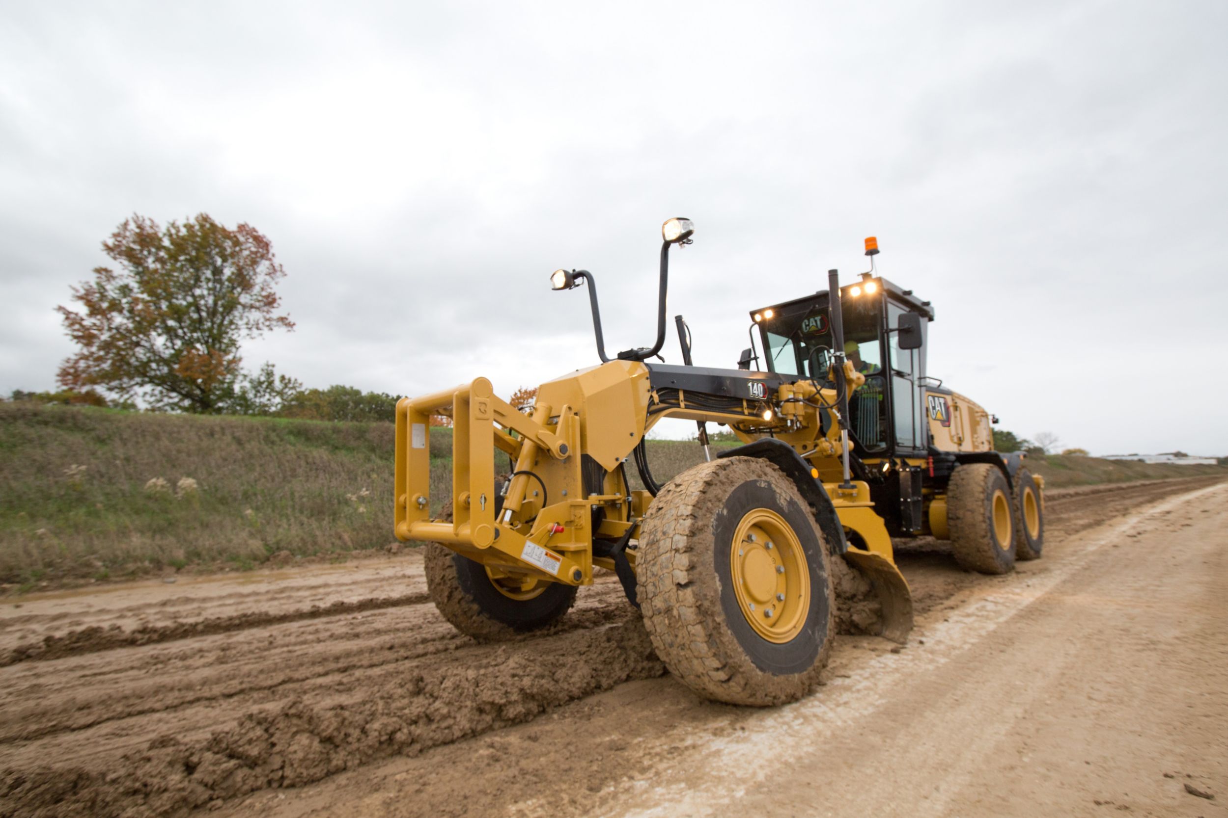 140 Motor Grader heavy blading roads