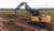 Grapple with Under/Under Heel shoveling logs