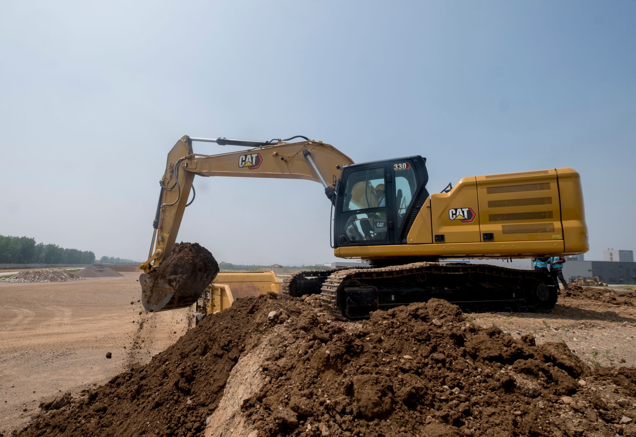 330 Excavator Loading a Truck