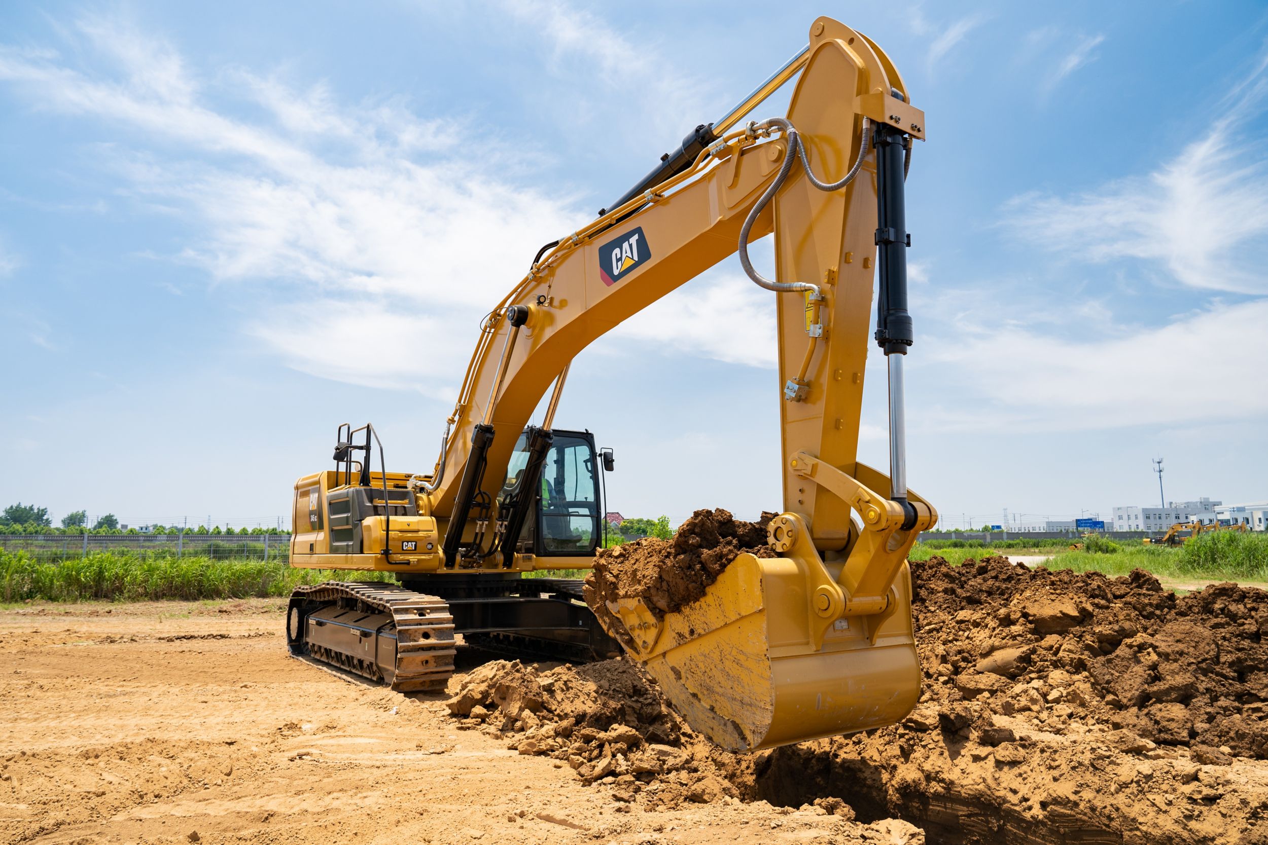 Cat® 345 hydraulic trackhoe excavators bring premium power, performance, control, digging, trenching, and heavy lifting capacity to your large scale projects.