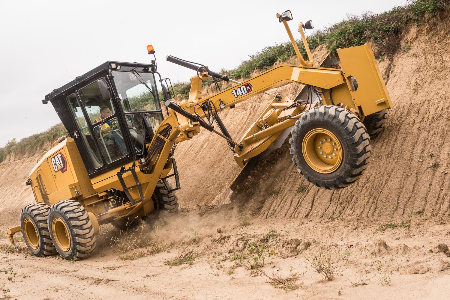 Hoge helling met behulp van de 140 GC motorgrader