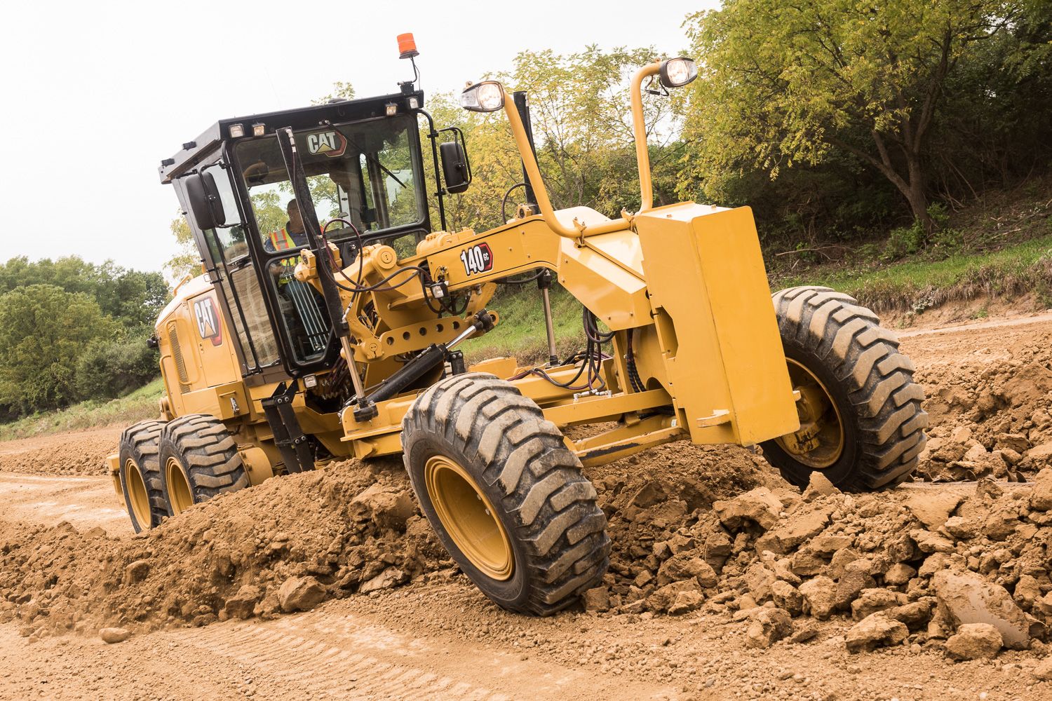 Bladgebruik met gekante wielen met de 140 GC motorgrader