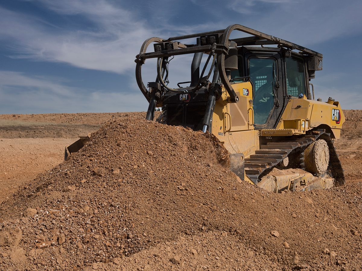 D6 XE Push Arm Bulldozer Working in an Oil Field