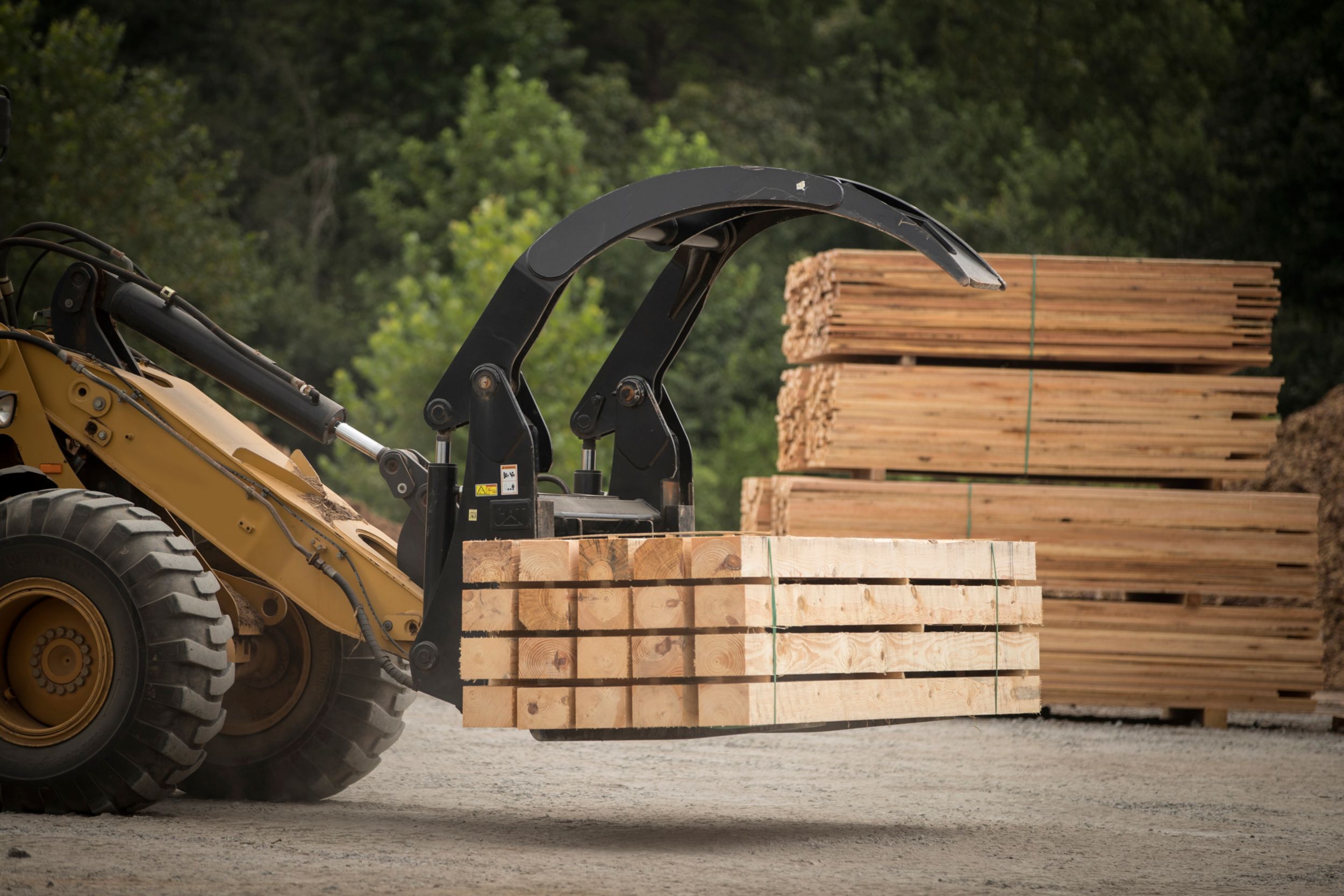 Semi Millyard Forks carrying sawn lumber.