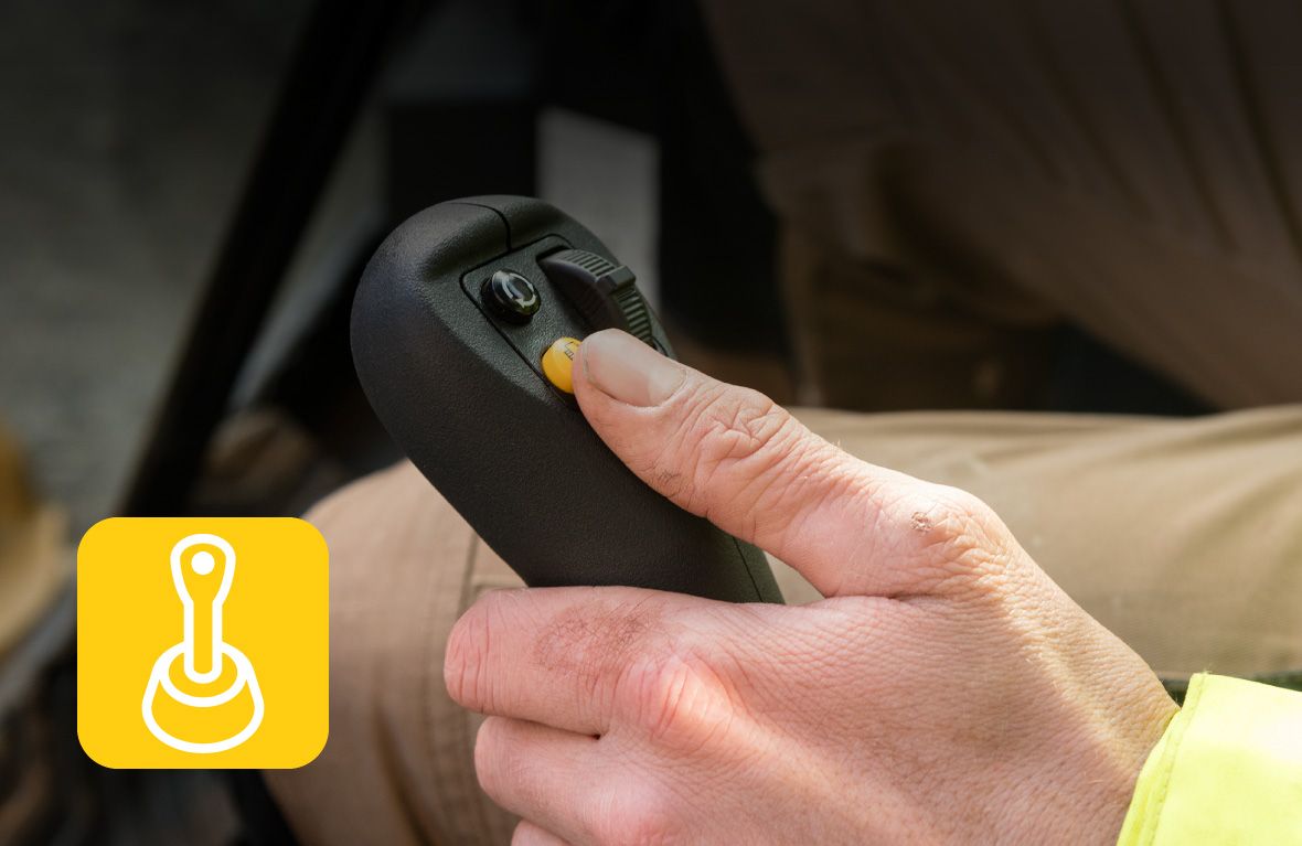 Operator using stick steer