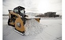 Cat® 289D Compact Track Loader and Snow Push at work in Colorado.