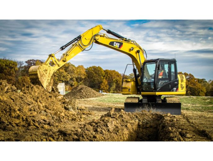 311F RR digging in trenching application with a General Duty Bucket