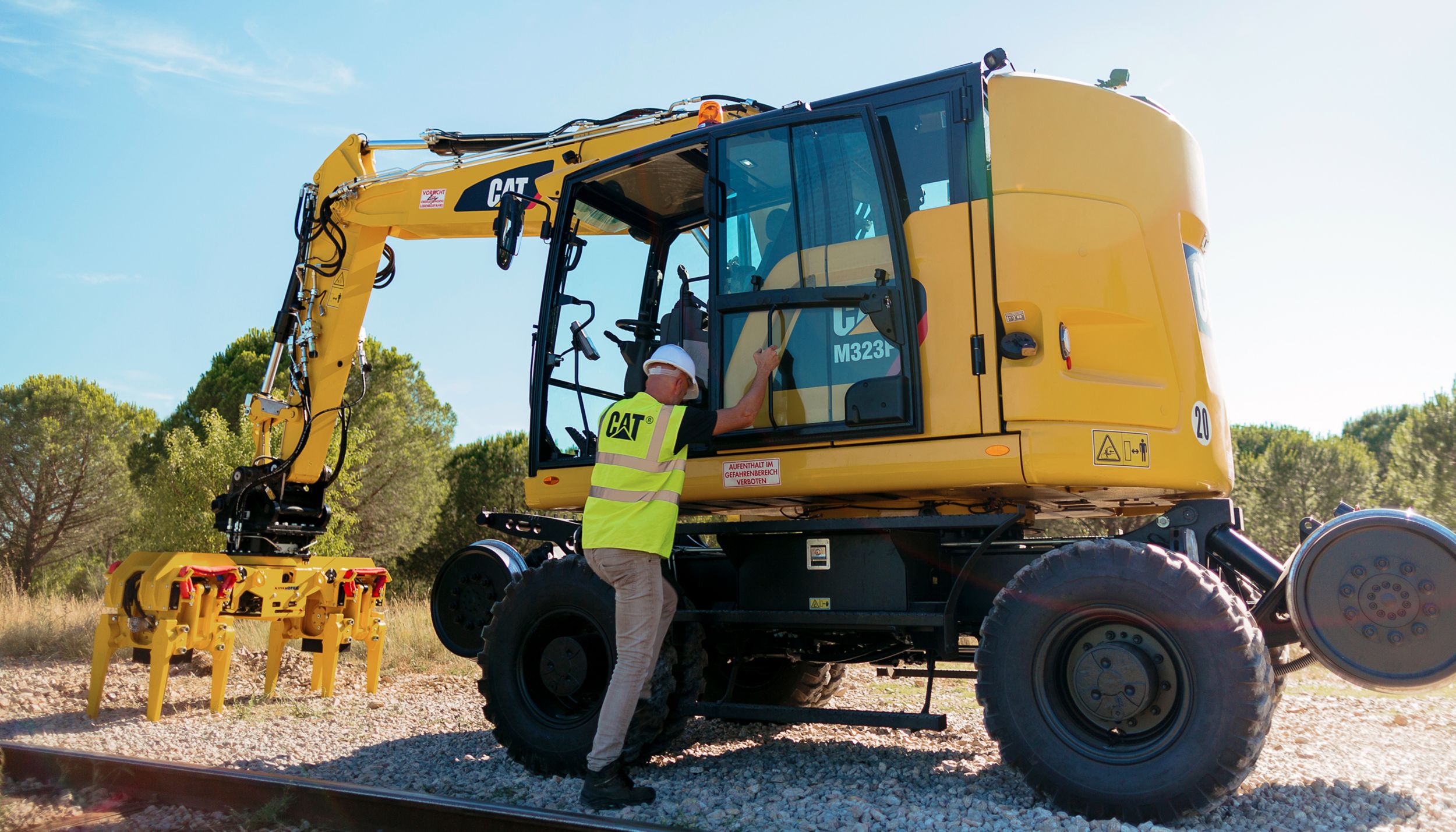 Cat M323F Wheeled Excavator - SAFELY HOME EVERY DAY