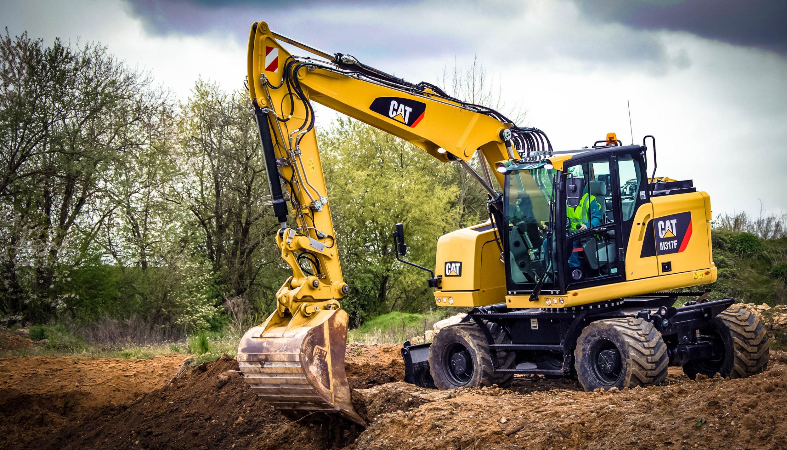 Cat | M317F Wheeled Excavator | Caterpillar