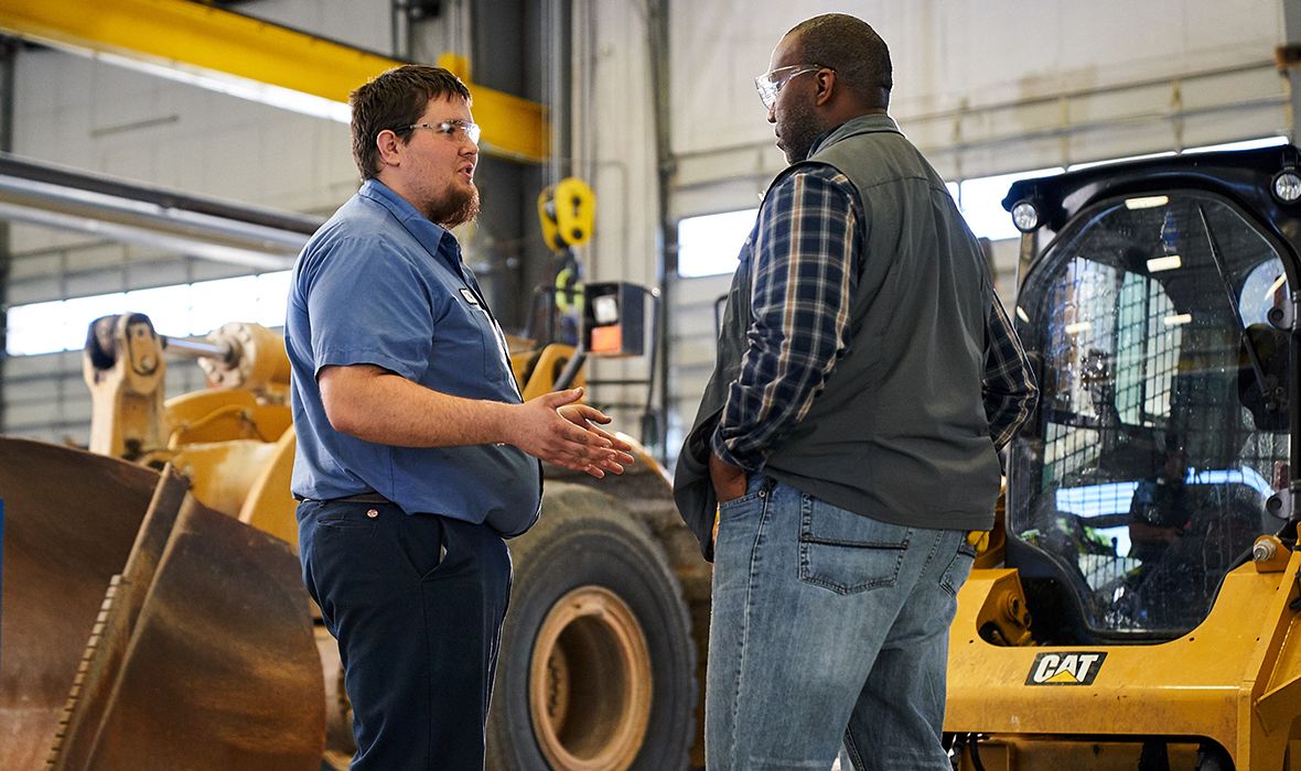 Cat Dealer and Happy Construction Customer
