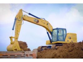 320 Medium Excavator using a General Duty Bucket to load a truck