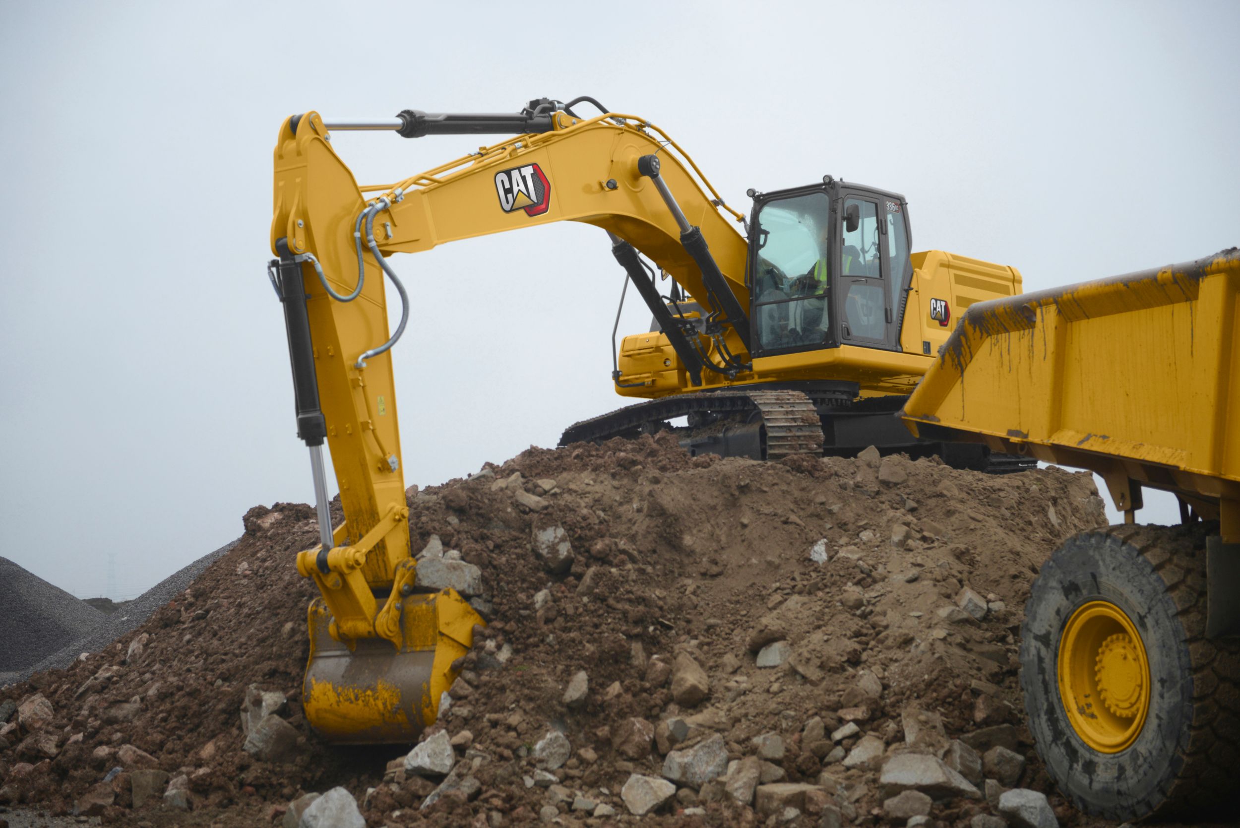 Cat® 336 GC hydraulic trackhoe excavators bring premium power, performance, control, digging, trenching, and heavy lifting capacity to your large scale projects.