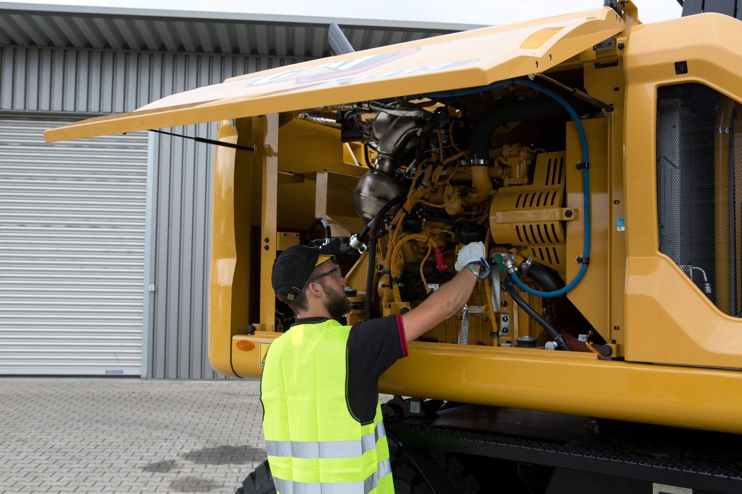 M314 Wheeled Excavator maintenance inspection