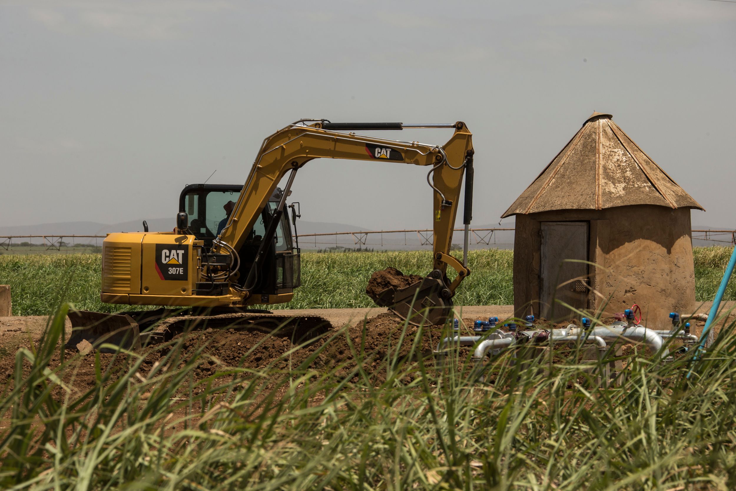 Miniescavadeira 307E trabalhando no Sul da África, anos 2000. 