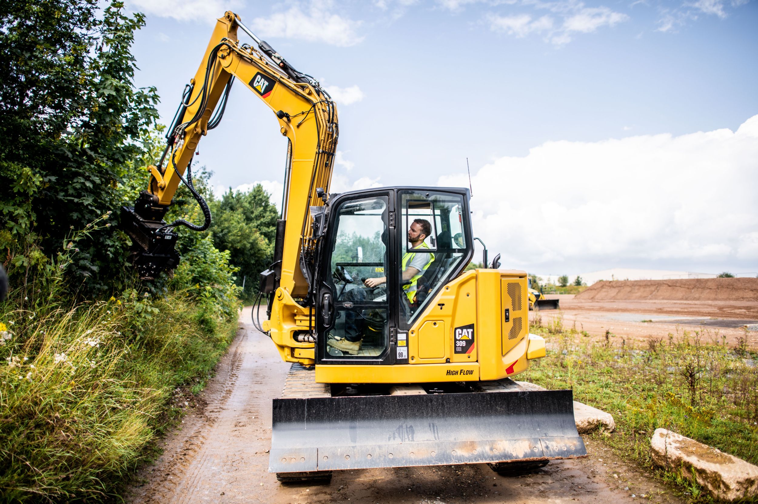 operator in Cat backhoe 