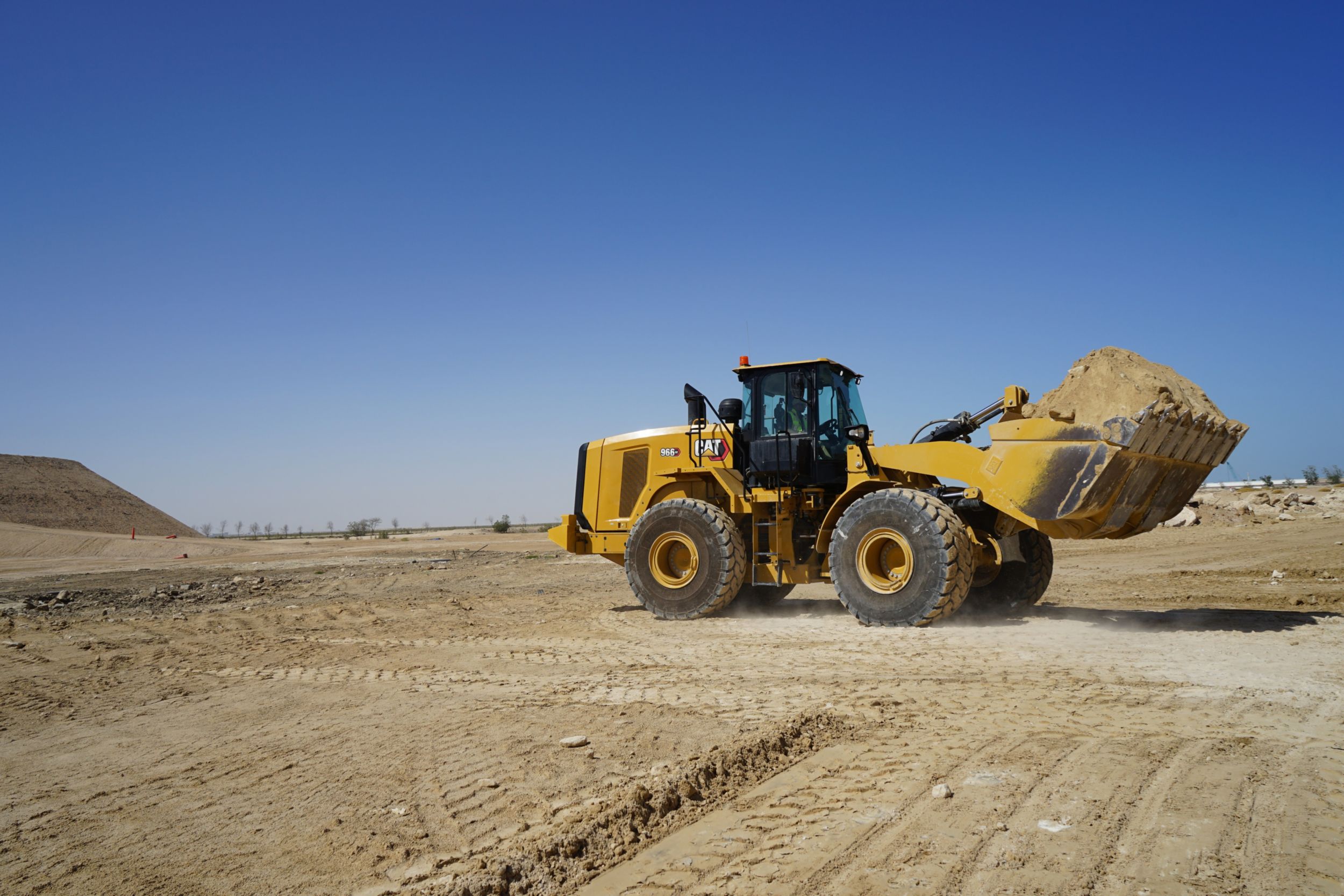 966 GC Medium Wheel Loader with a Full Bucket