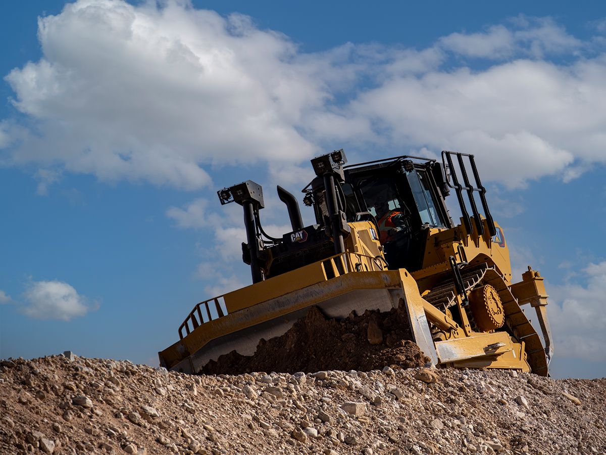 Dozer D7 gebruikt GPS op een helling