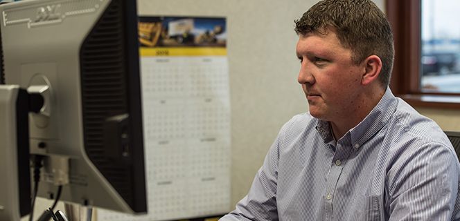 Man Looking at Computer