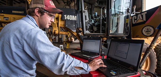 Technician on Computer