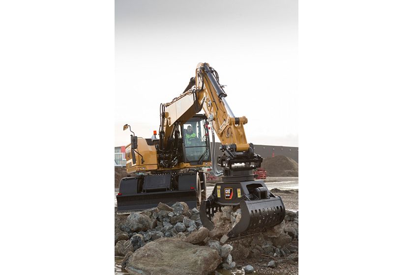Tackle rocks with the grapple on the M318 Wheel Excavator