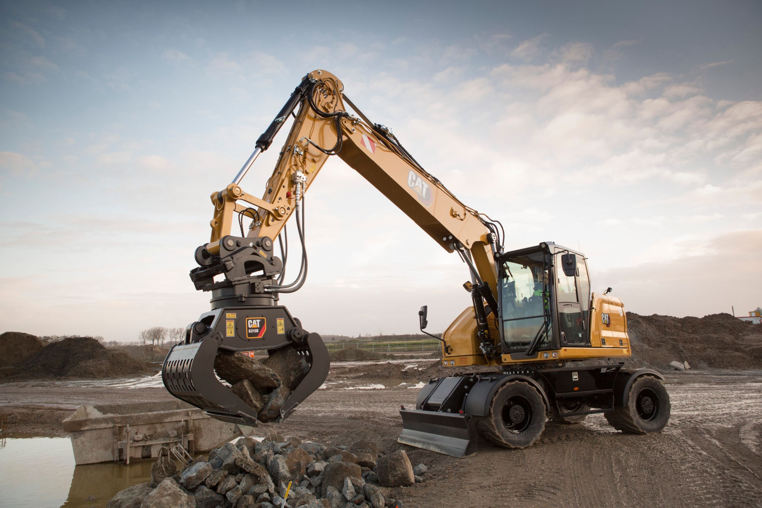 New M318 Wheeled Excavator for Sale - H.O. Penn