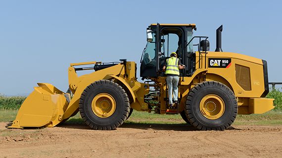 Operator getting into 950 GC wheel loader