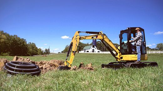 Mini Excavator digging