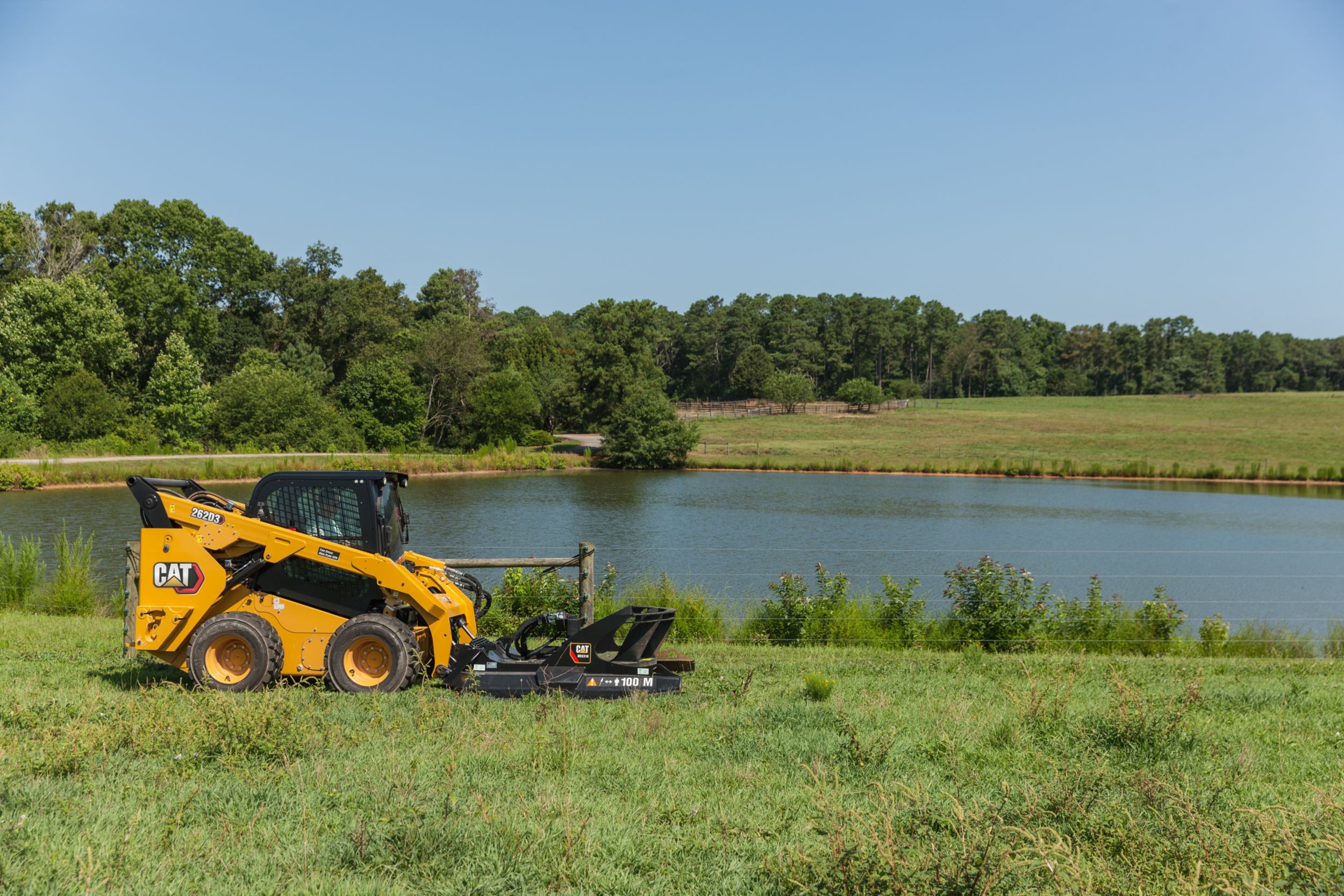 A skid steer loader with a brushcutter
