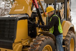 customer servicing Backhoe Loader