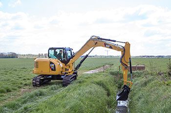 Mini excavator digging
