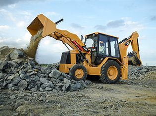 Two customers on jobsite in personal safety gear