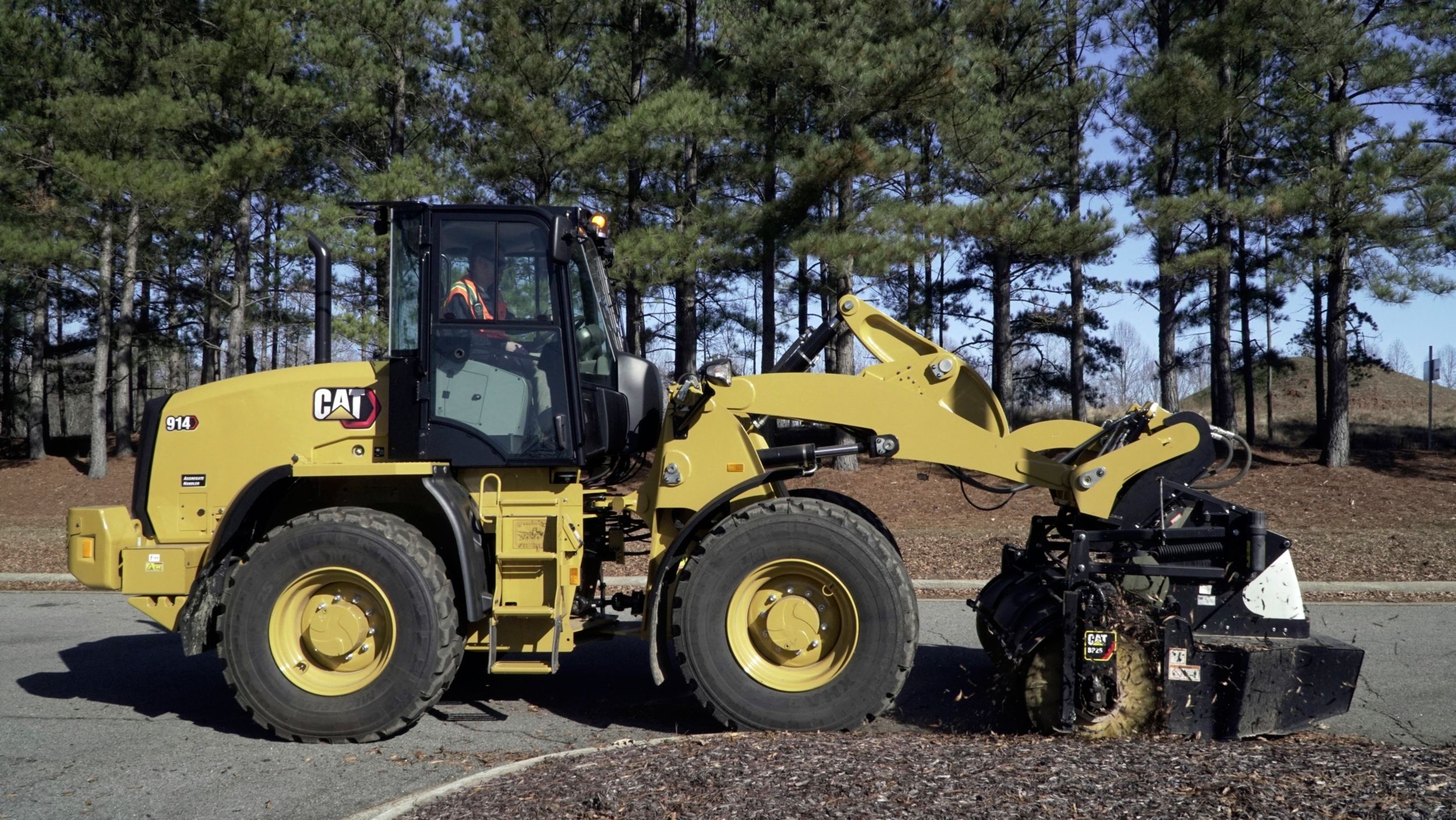 Cat® Pickup Broom at Work>