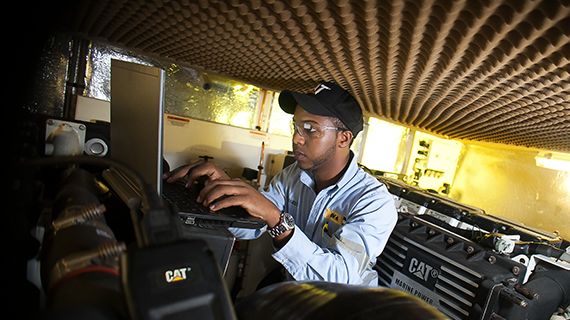 Cat dealer parts and service team member