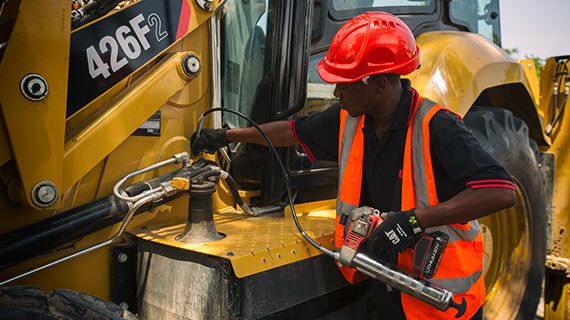 Two customers on jobsite in personal safety gear