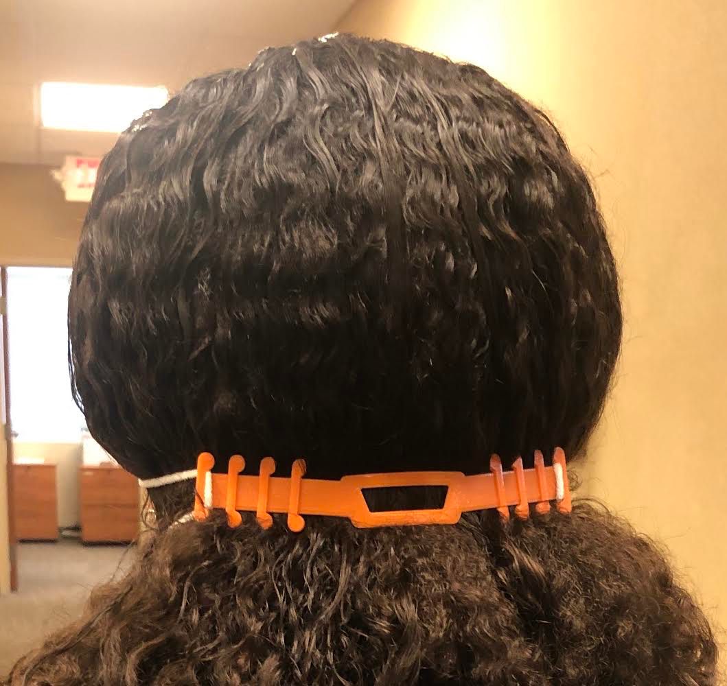 One of the more than 6,000 mask buckles the team printed and distributed to Chicago area medical facilities.