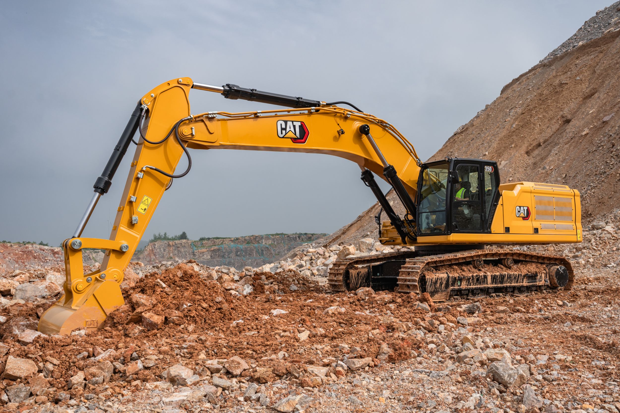 With Cat attachments, the 350 cuts through tough material quickly and efficiently.