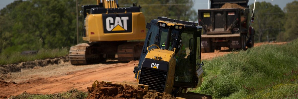 Cat machines on jobsite
