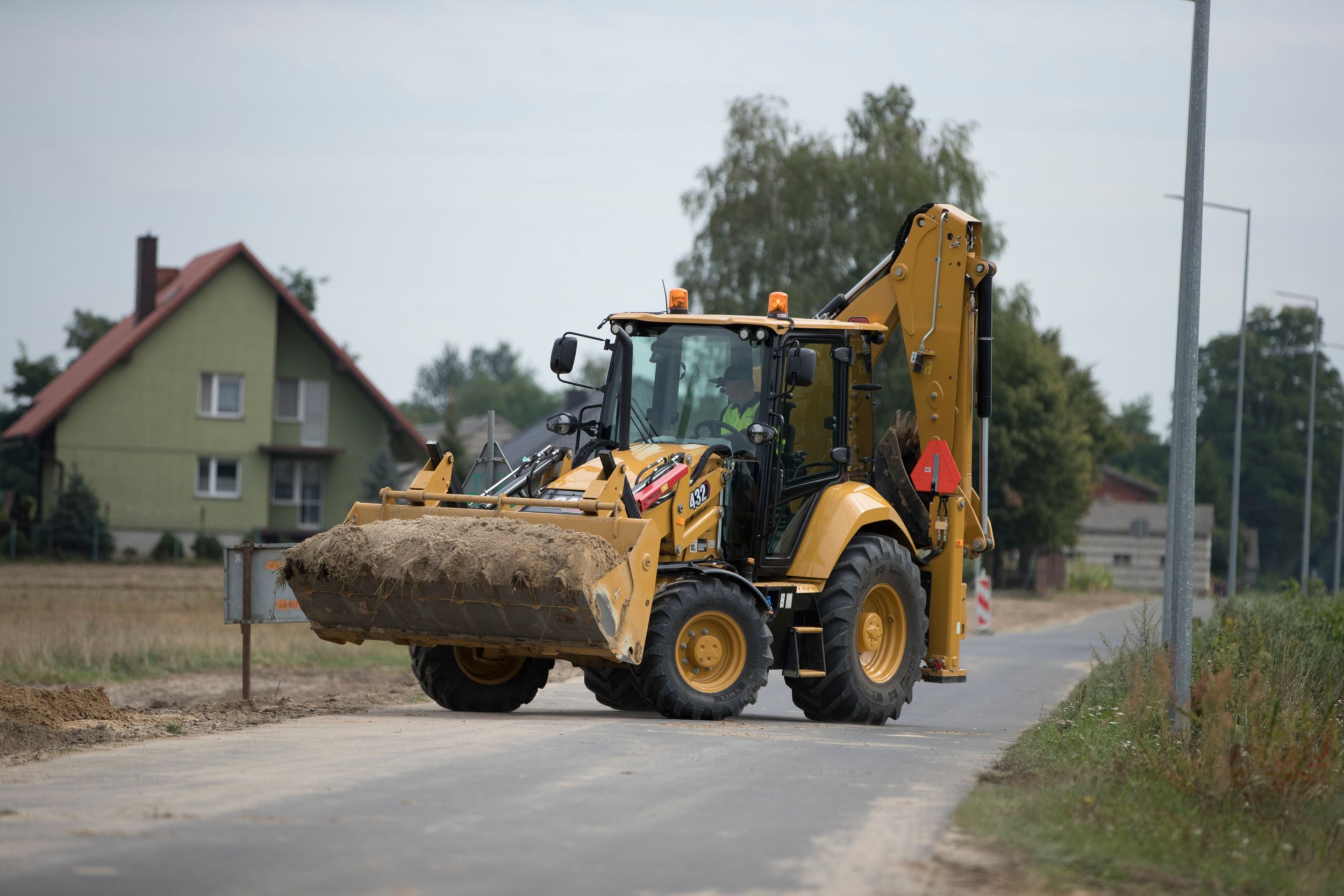 The 432 Backhoe Loader.