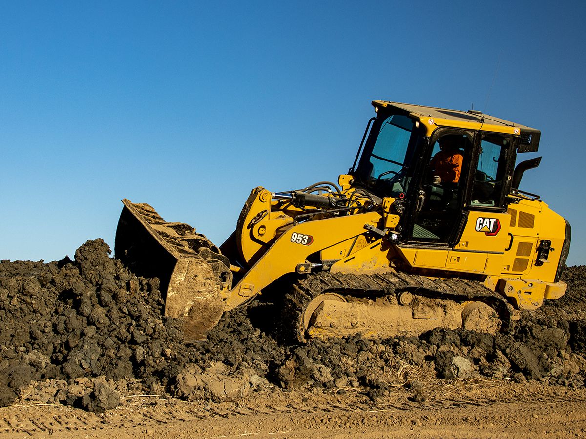 953 track loader grading on a slope