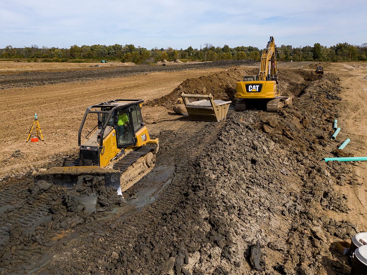 D4 dozer finishing trench backfill