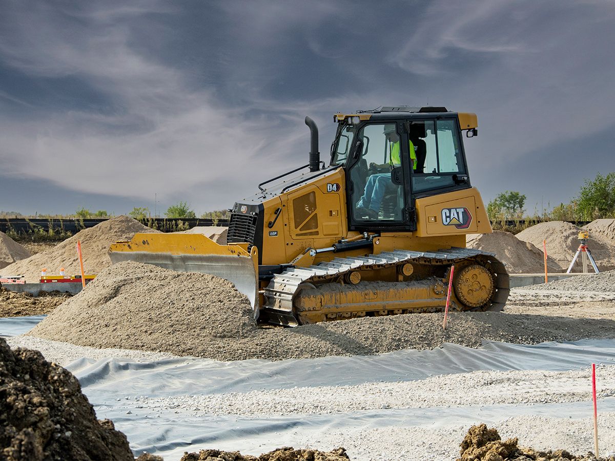 D4 VPAT bulldozer grading in gravel